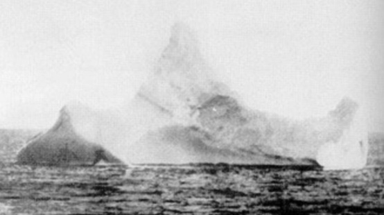 Photo:  photo of the iceberg that sank Titanic (by the chief steward of SS Prinz Adalbert).Its identity was confirmed by a red streak of paintwork scraped across its base
